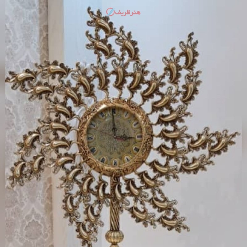 مشخصات، ساعت دیواری طرح فرفره ساخته شده از آلومینیوم با روکش برنز با رنگ ثابت، زیر قیمت بازار | هنرظریف