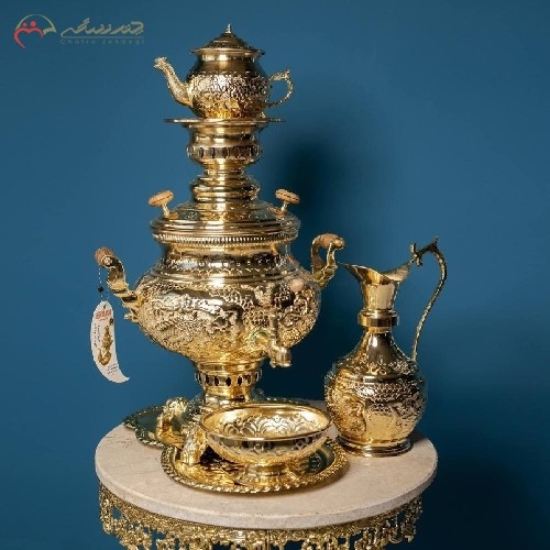 خرید آنلاین، سماور زغالی برنجی طلایی رنگ در  طرح گل مرغ، پر نقش و زیبا همراه با 5 سال ضمانت نامه، زیر قیمت بازار | هنرظریف