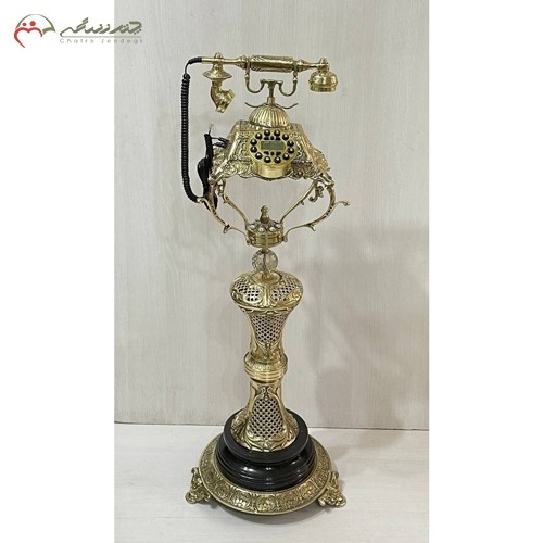 تلفن ایستاده برنزی پر نق و نگار طرح ستون زنبوری برجسته و با پایه سنگی، طلایی رنگ