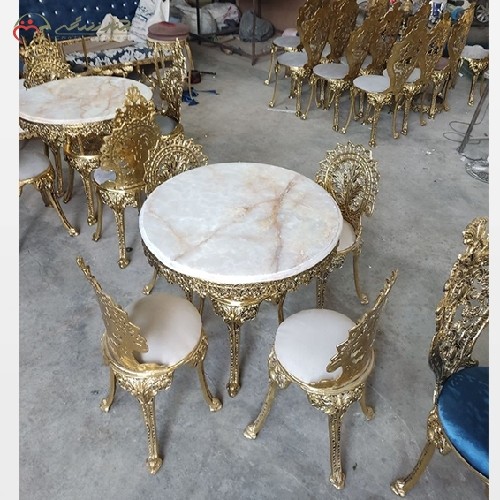 میز ناهار خوری آلومینیومی 4 نفره مدل پسر بچه و صفحه سنگ مرمر طراحی آنتیک