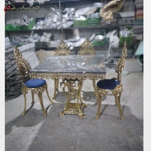 میز ناهار خوری از جنس برنزی مدل پسر بچه و پایه اسبی با صفحه سنگ مشکی، با کیفیت عالی - هنرظریف